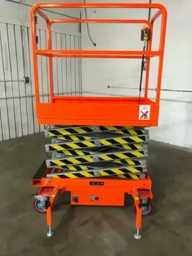 FREE SHIPPING NEW 5 STAR 19 FEET MAX LIFT ELECTRIC SCISSOR LIFT MAN LIFT Close-up of the lift's rechargeable battery and power cord