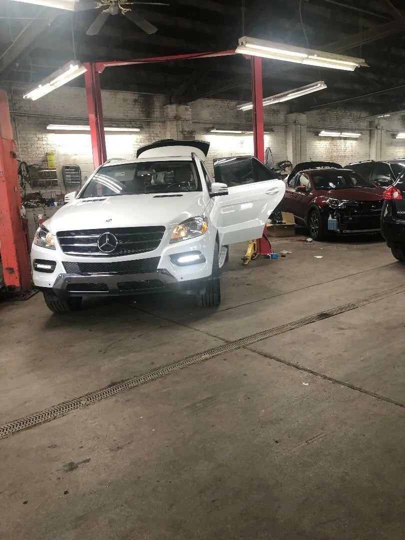 NEW 2 Post Overhead 12000 Lbs Automatic Release Mechanic Lift hoist + Handlejack Overhead View of 12000 Lbs Car Lift in Garage