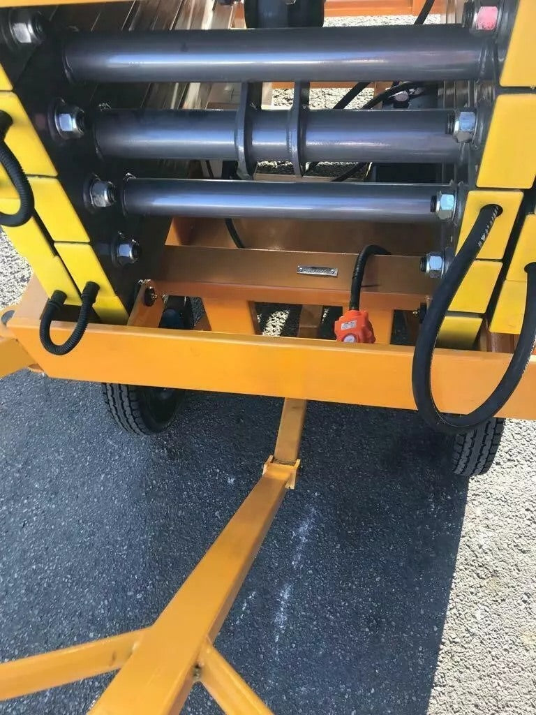 Pneumatic tires on scissor lift