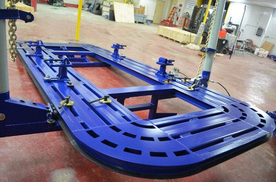 Clear floor pulling towers with 360-degree pulling capability for auto body repair
