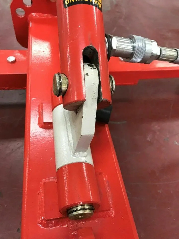 Complete Auto Body Frame Puller kit displayed on a workbench
