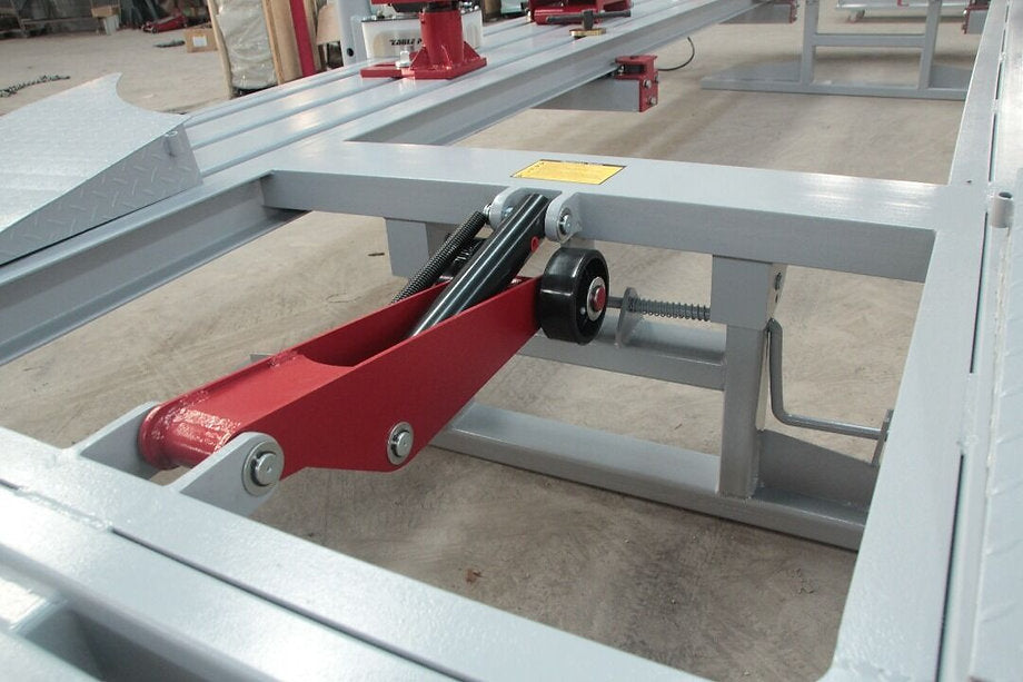 Full-frame vehicle being repaired on the 20ft tilt bed auto frame machine
