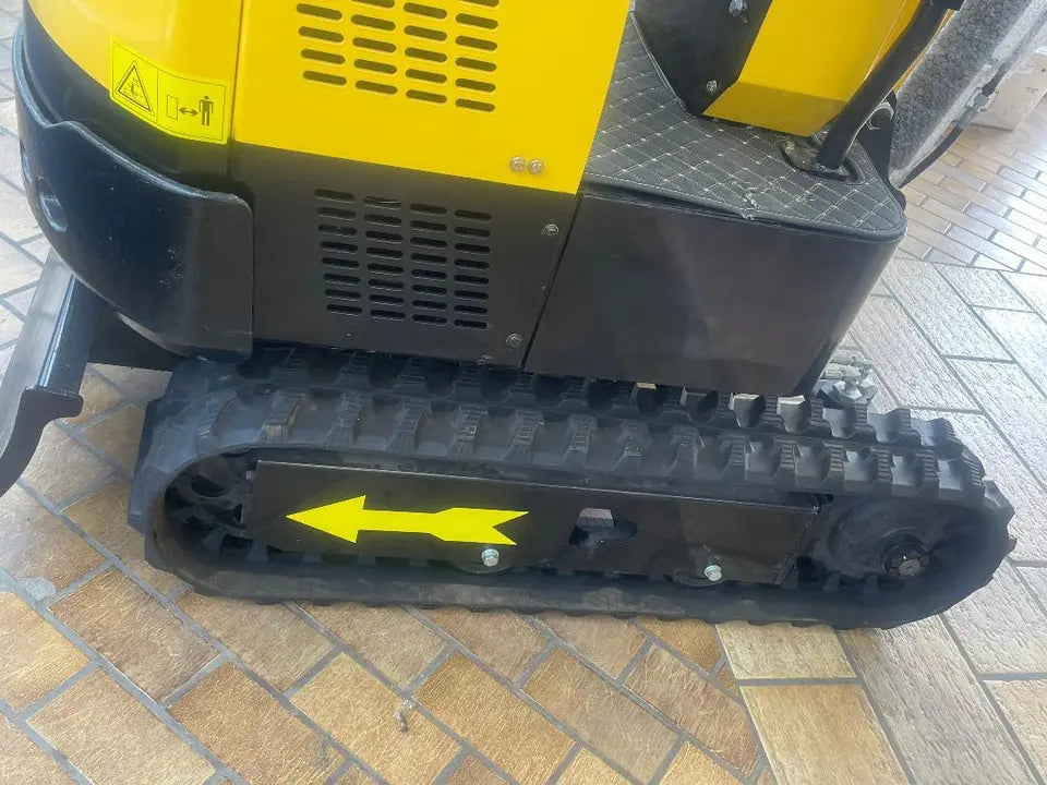 Mini Excavator digging a trench