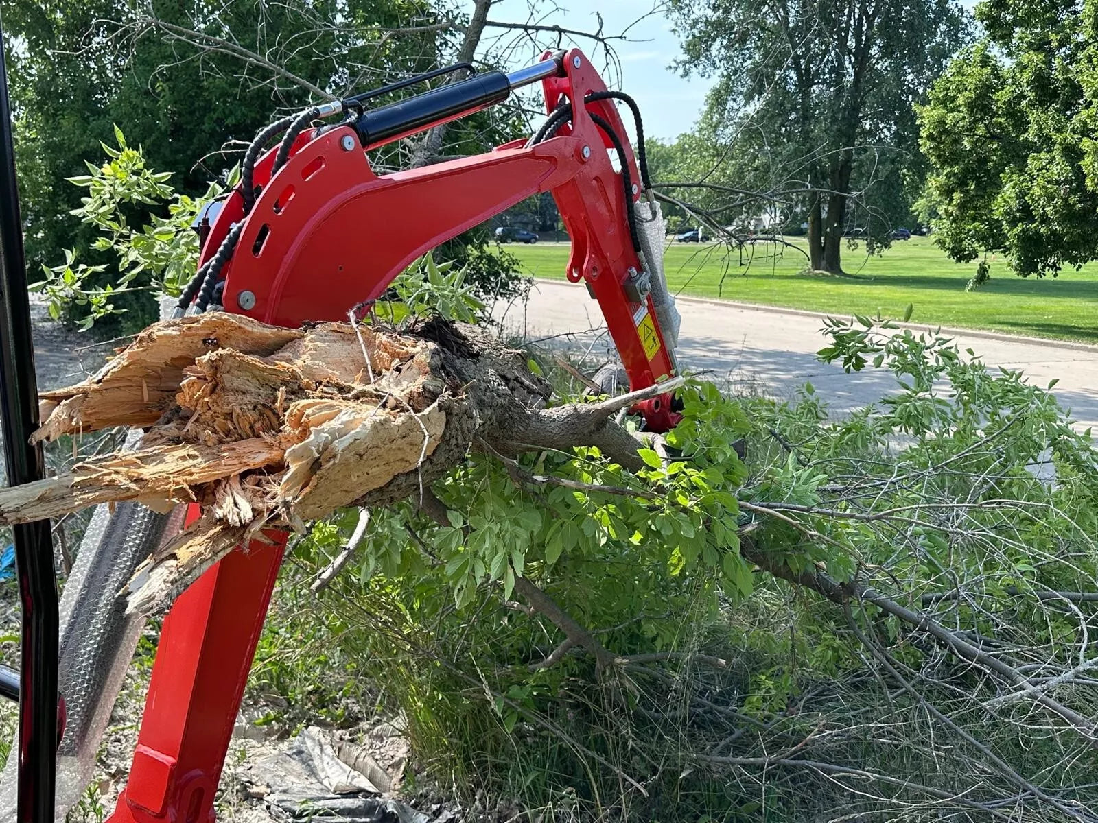 New 2024 Mini Excavator in action on construction site

