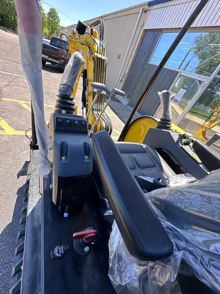 Operator's seat inside the 3.5 Ton mini excavator cabin.
