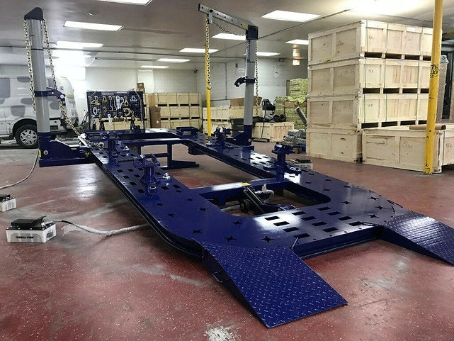 Pinchweld assemblies with clamps for securing vehicles during frame repairs