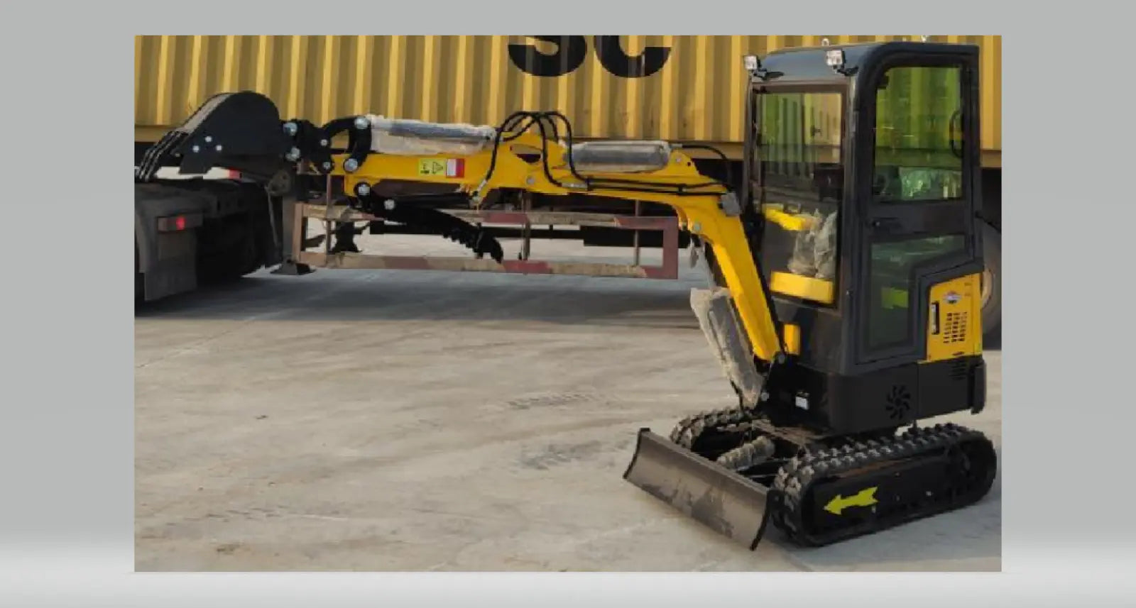 STR100 Mini Excavator showing compact dimensions and sturdy design