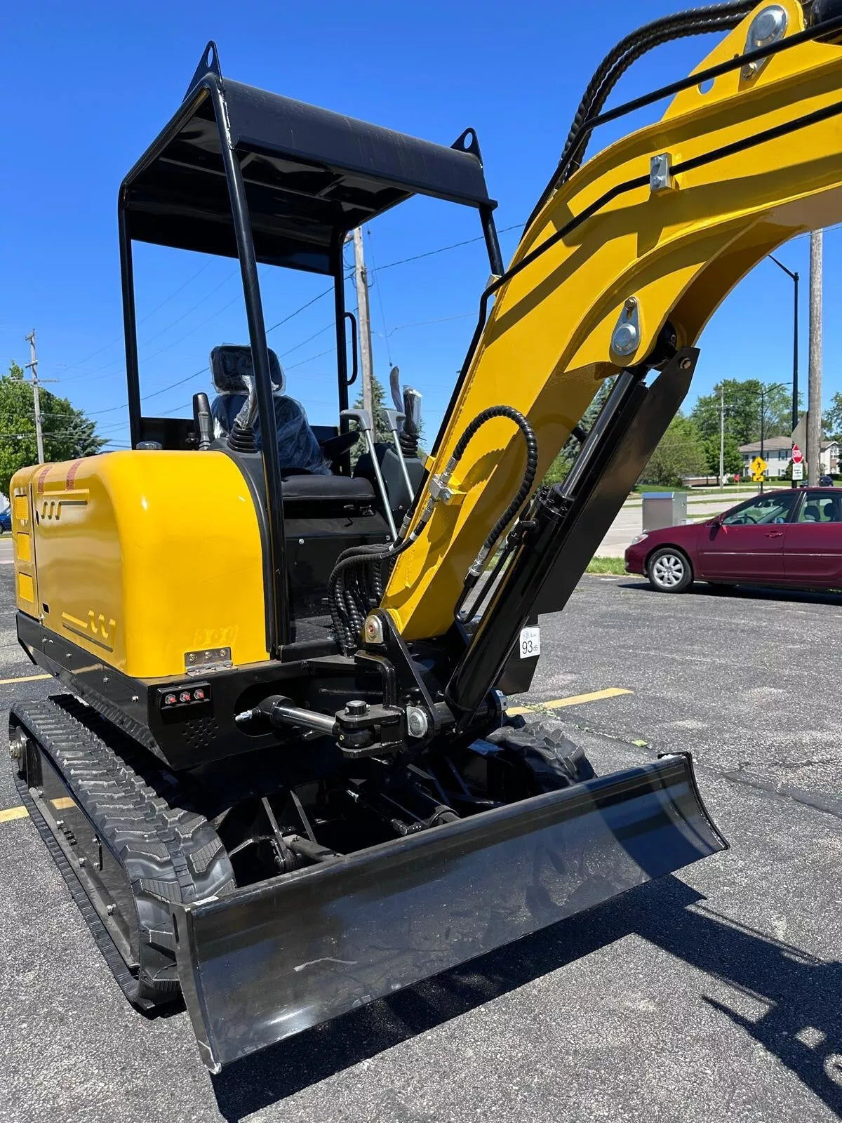 Side View of Excavator with Kubota D902 Engine