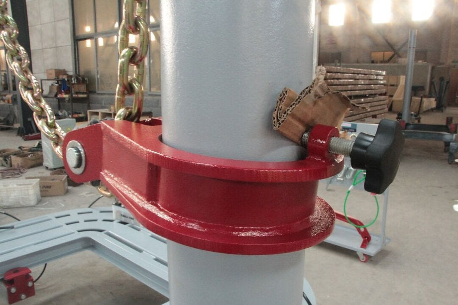 Side view showing the hydraulic tilt bed and adjustable clamps

